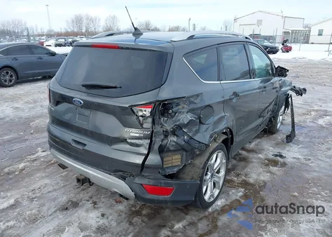 2019 Ford Escape Titanium z USA, uszkodzony, nr VIN 1FMCU9J91KUB92295
